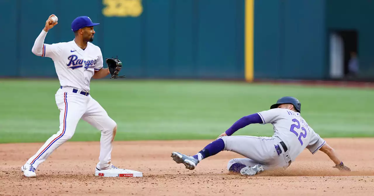 Rox win game-ending review in 10th, spoil Texas' home opener