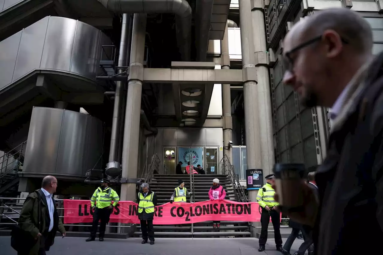 Extinction Rebellion block entrance to Lloyds of London headquarters