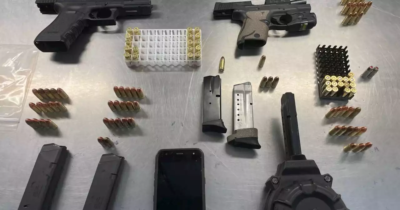 2 men found with guns, ammo and drugs in Liberty Park