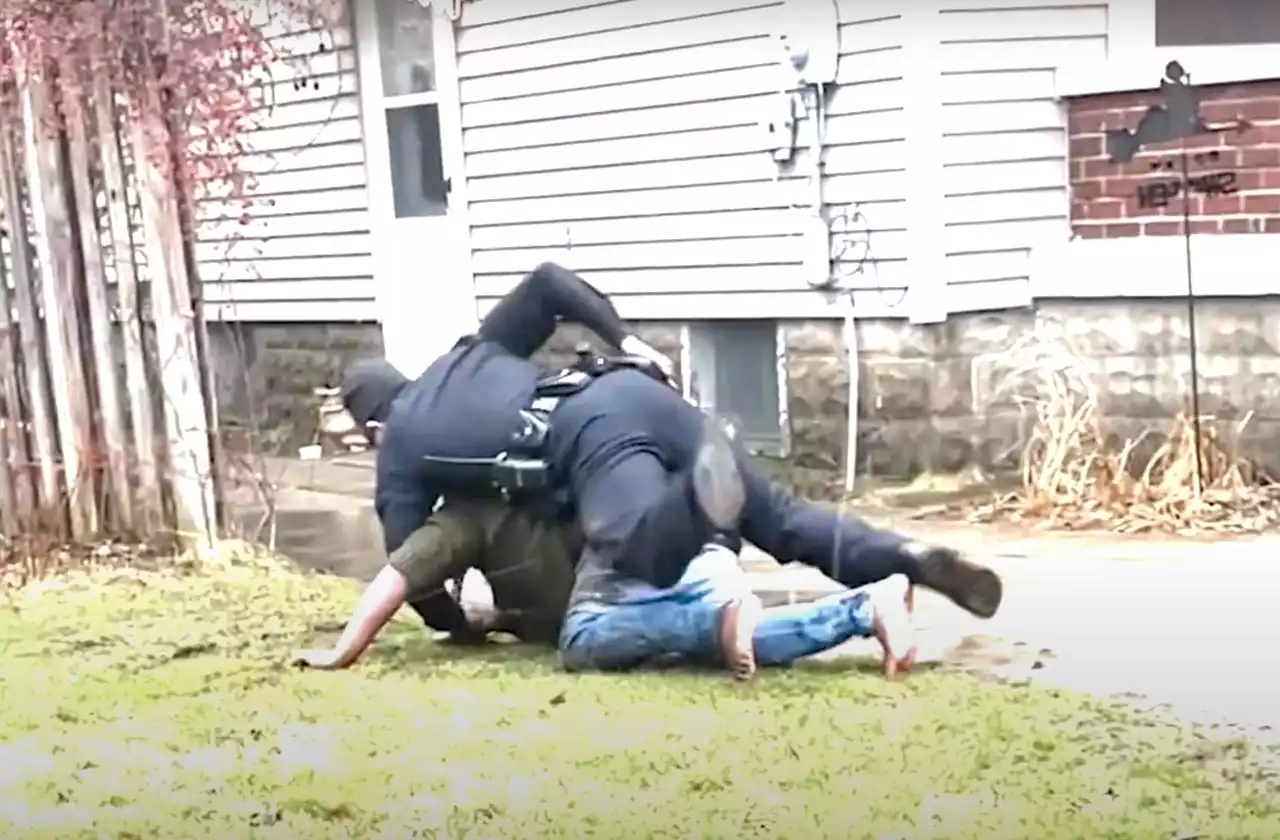 Video shows Michigan police officer shoot Black man in back of head during struggle over Taser