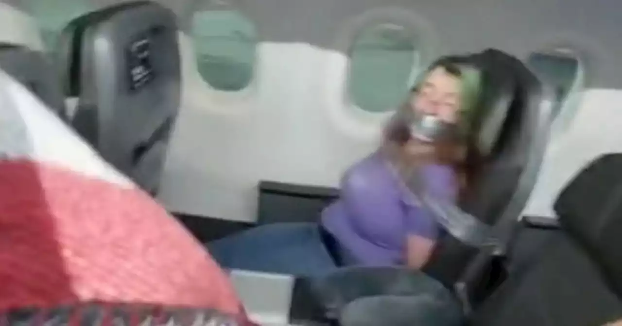 Huge fine for passenger duct-taped to chair after trying to open door mid-flight