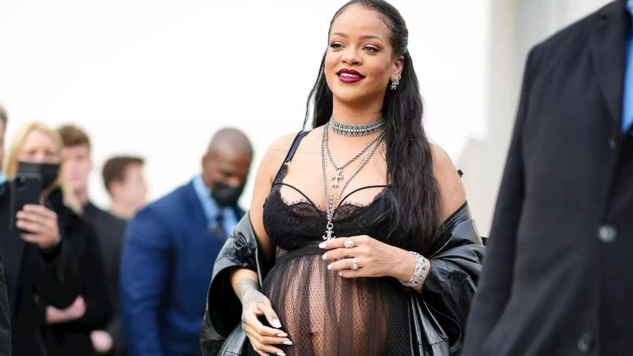 Rihanna shows off her baby bump on the cover of Vogue