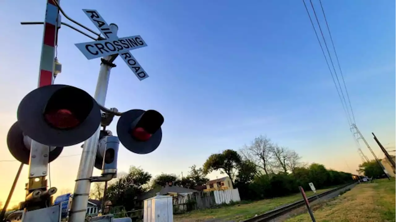 Man standing on train tracks struck by train, police say