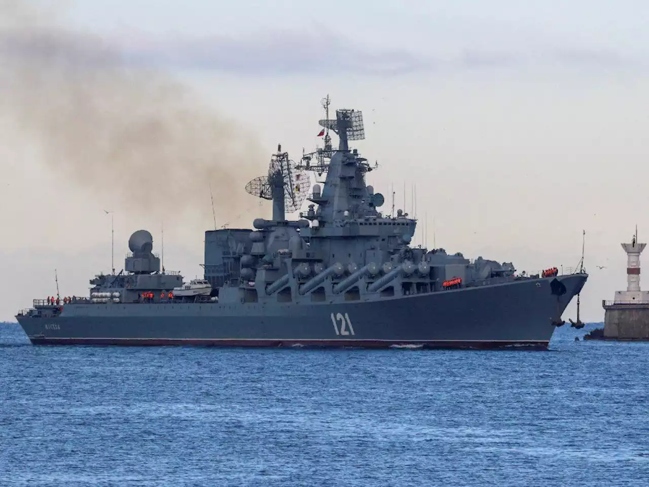 Russia says damaged warship to be towed back to port, as Ukraine claims missile hit