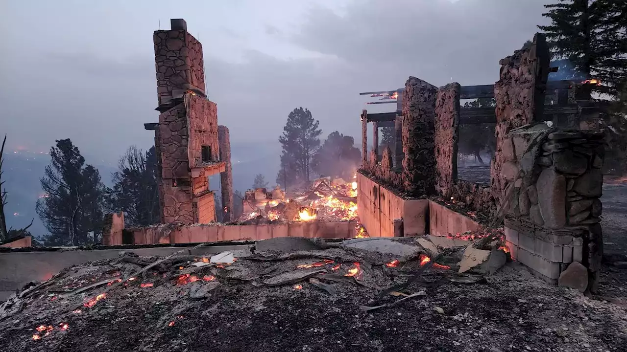 Wind whips destructive wildfires in New Mexico, Colorado