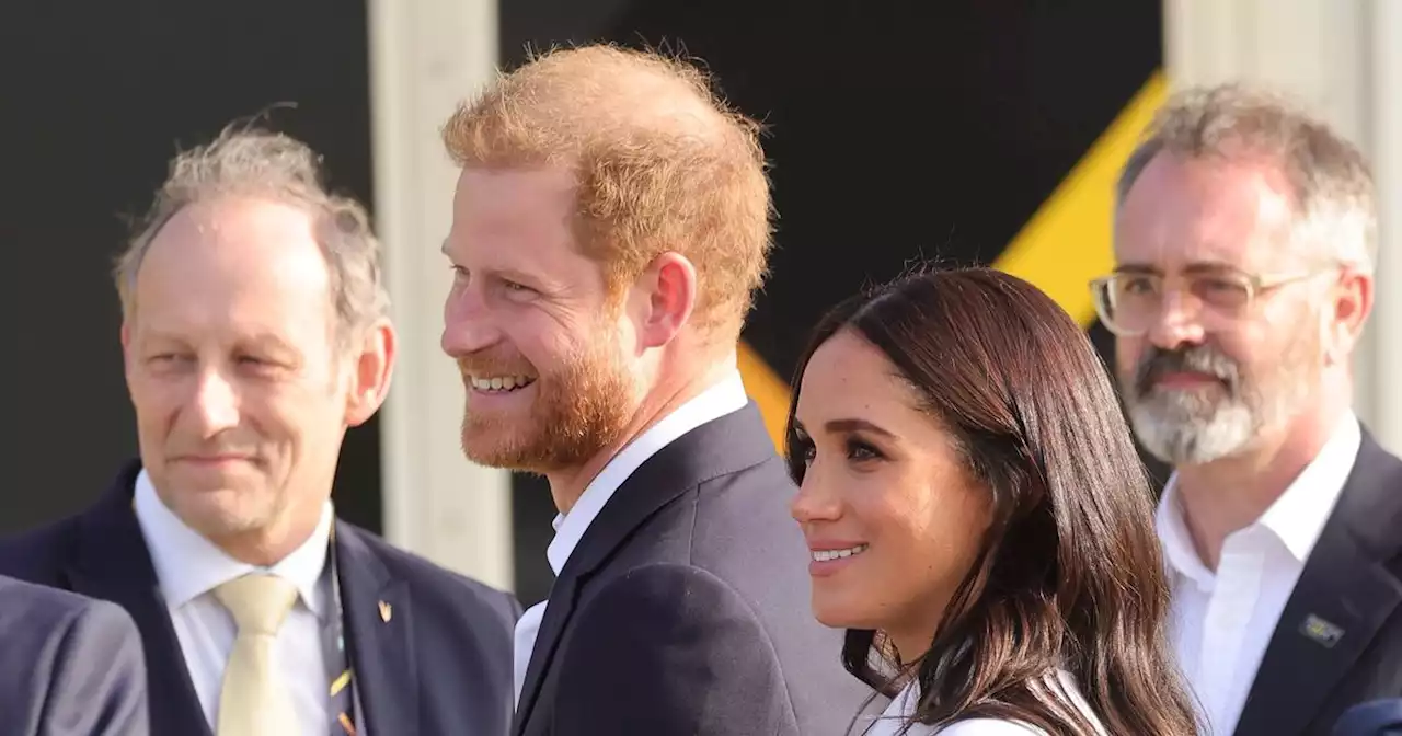 Harry and Meghan beam as they arrive in Europe for first time since royal exit