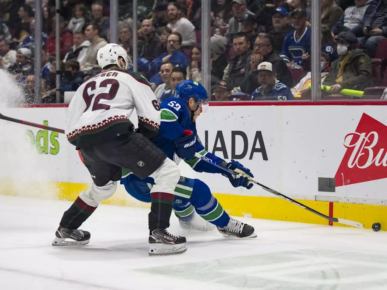 Canucks' captain Bo Horvat leaves game with leg injury