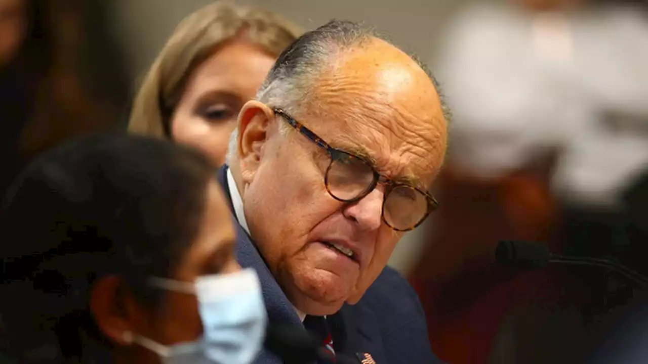 Giuliani helps feds unlock devices as charging decision looms