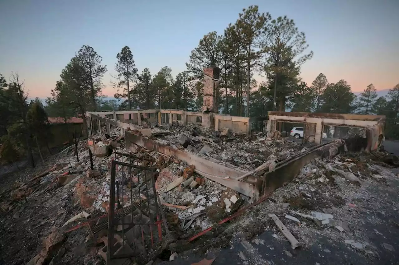 New Mexico village seeks prayers as deadly wildfire rages