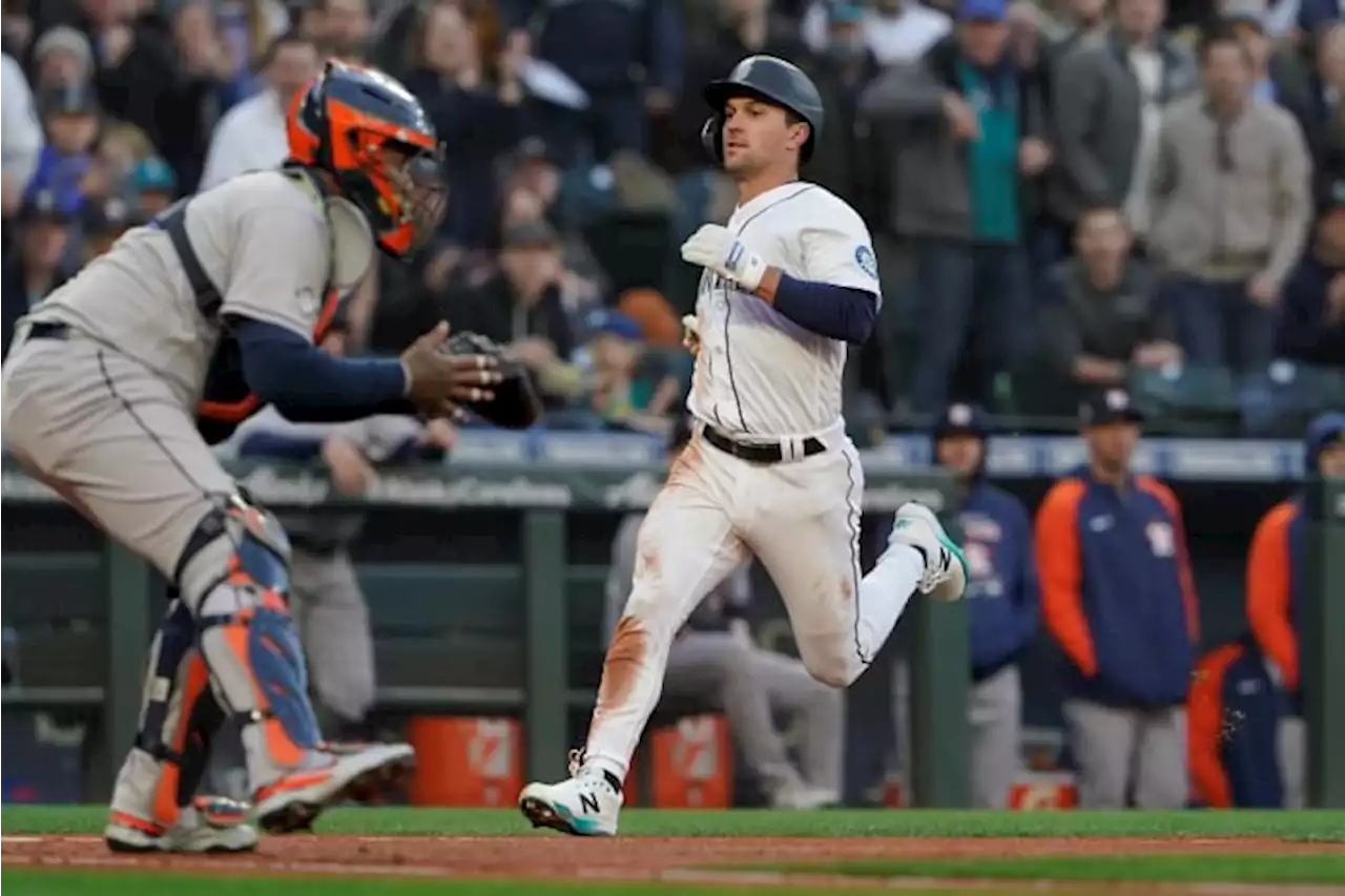 Frazier, Gonzales lead M’s past Astros 11-1 in home opener