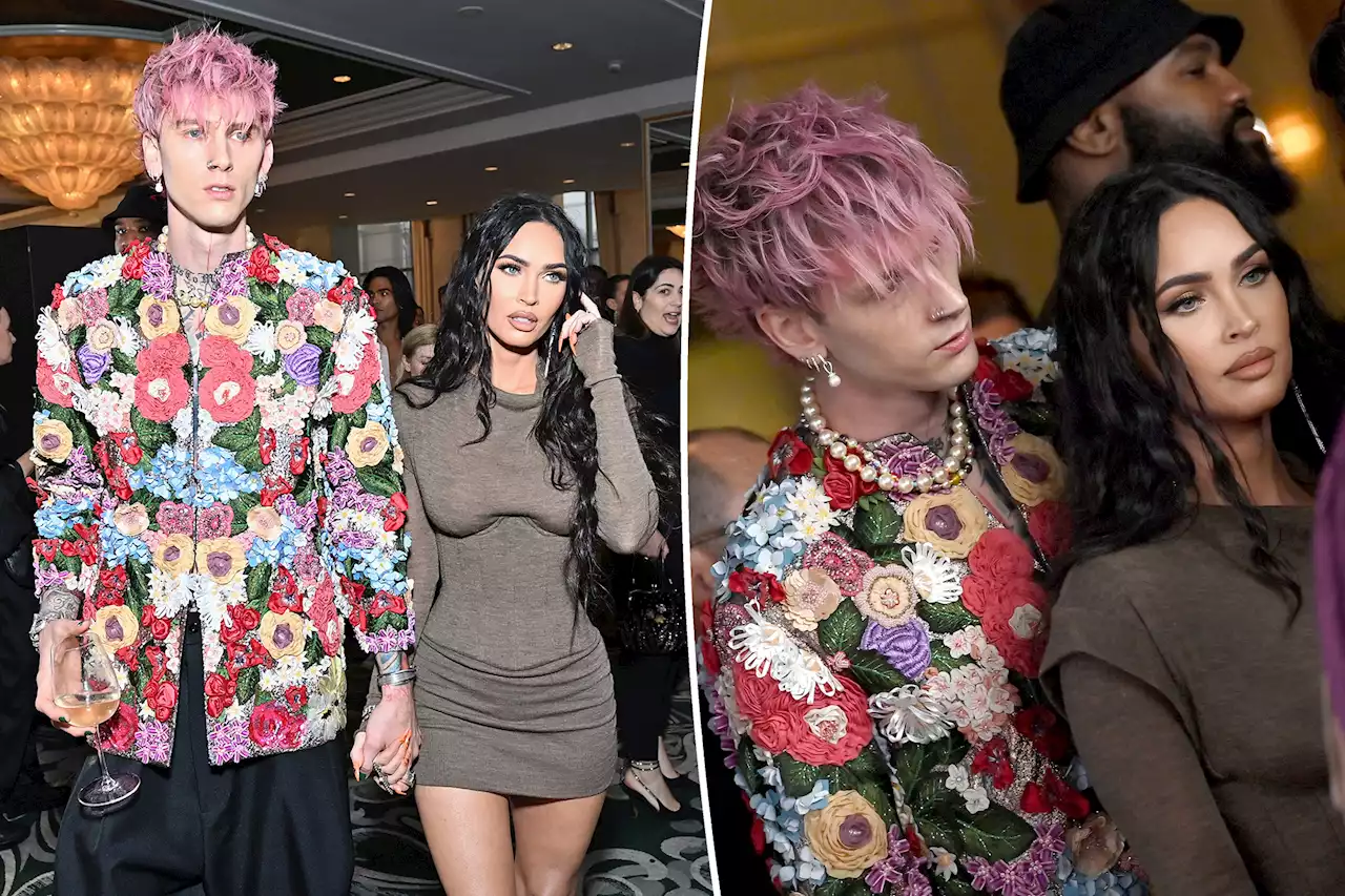 Megan Fox dodges Machine Gun Kelly PDA in tense red carpet video