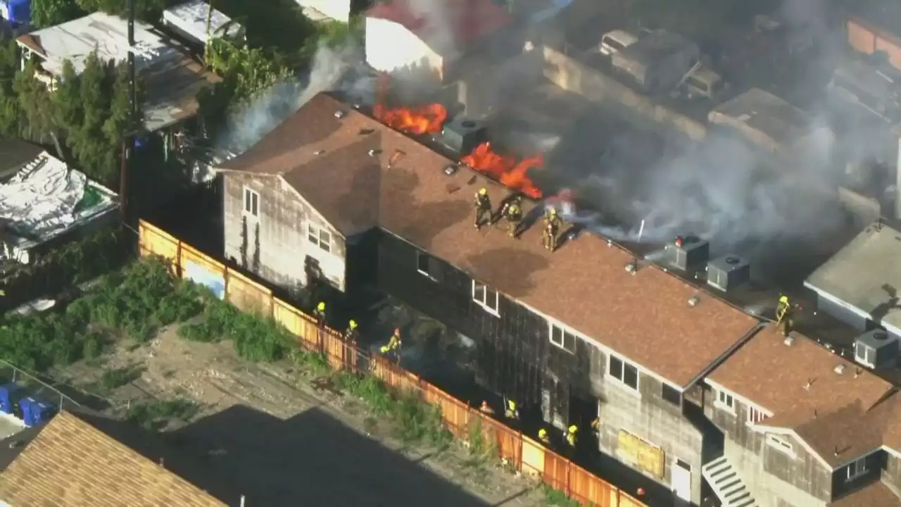 Crews battle apartment fire in Los Angeles