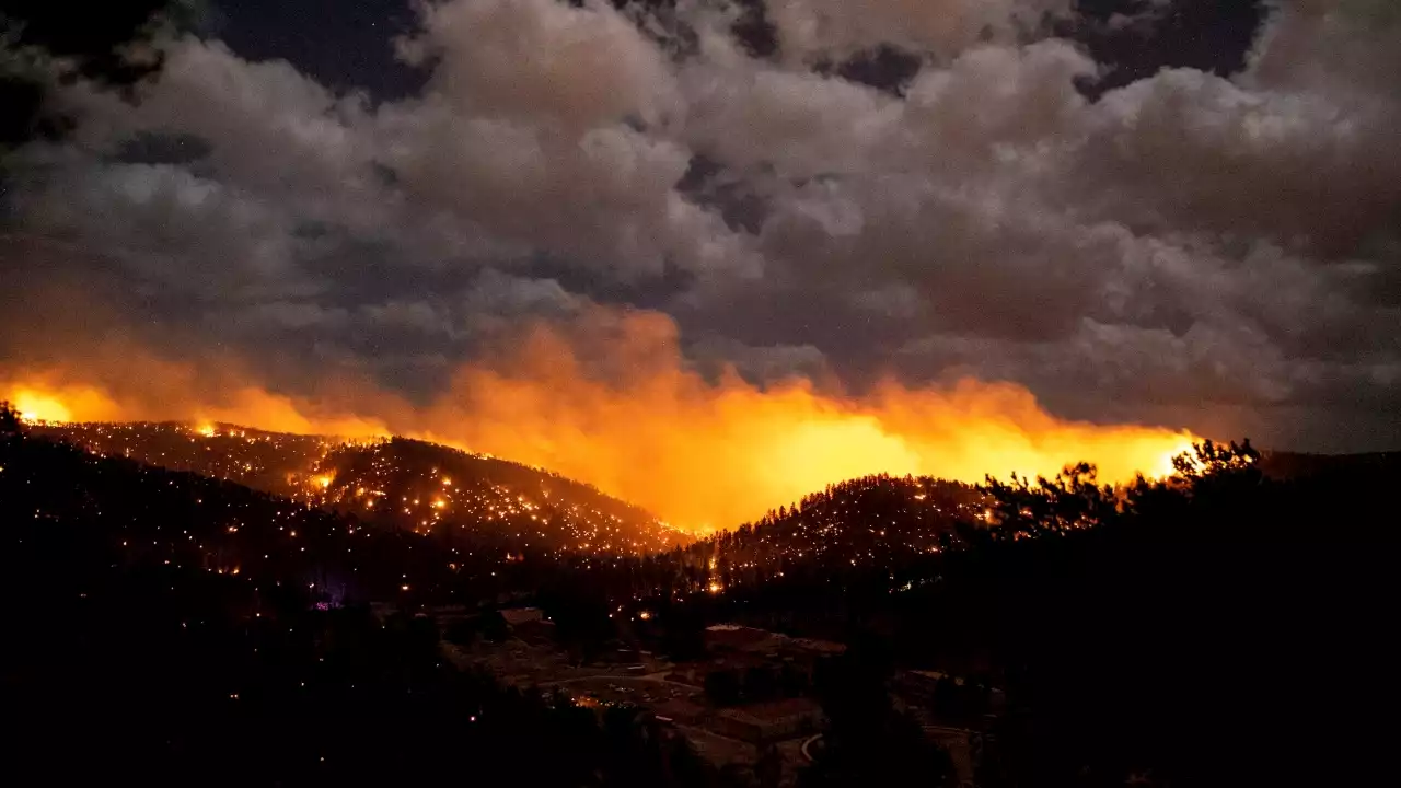 New Mexico wildfires force thousands more to evacuate