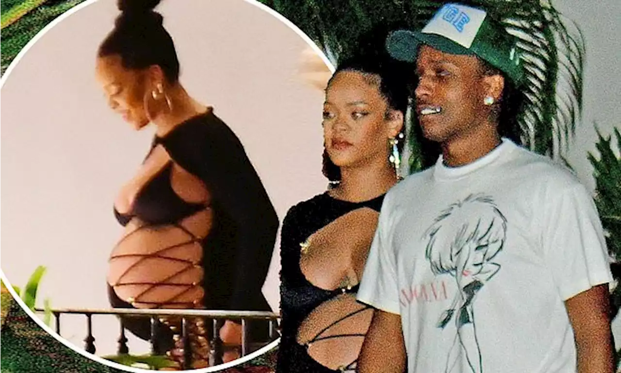 Pregnant Rihanna exposes her growing baby bump in a minidress