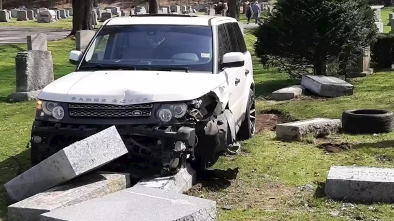 Woman crashes into 18 headstones during driving practice in cemetery