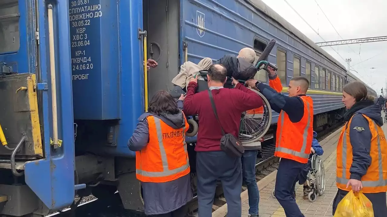 Ukraine war: Shelling and bombing continues in Donbas region as country's most vulnerable fill up trains