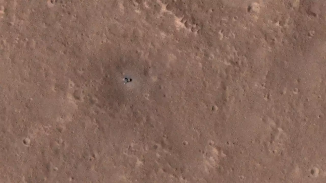 NASA's InSight Mars lander spotted from orbit, covered in dust