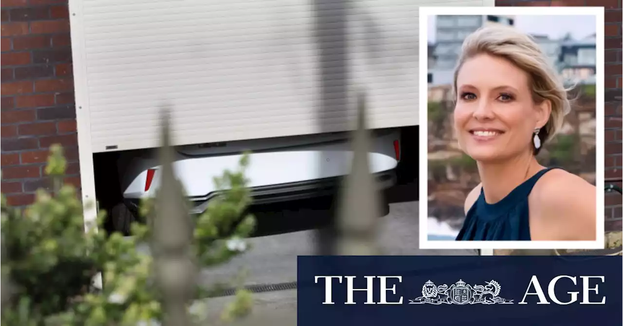 ‘I’m not going anywhere’: Deves vows to fight on after hiding from media in garage