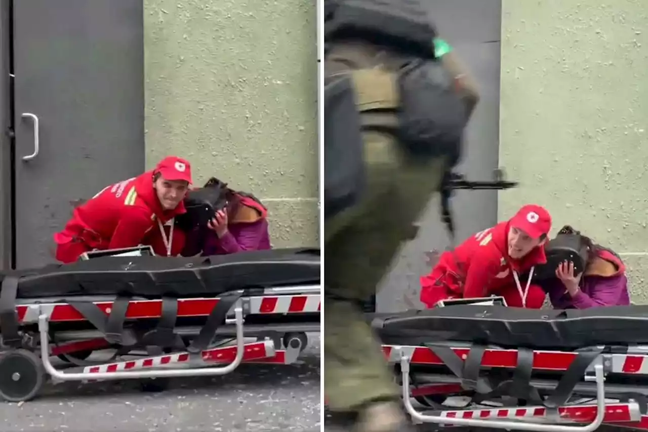 Hero medic shields wounded civilian from Russian 'double tap' rocket blitz