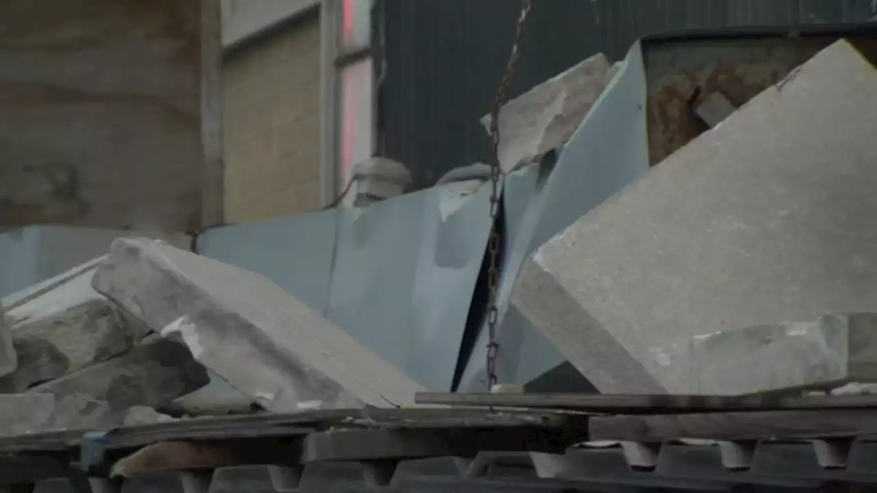 Woman sues after skull smashed by concrete falling from West Town building