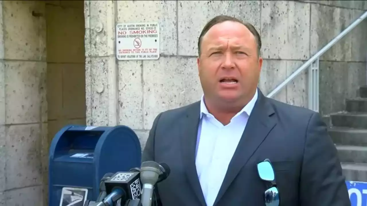 Infowars files for bankruptcy as founder Alex Jones faces lawsuits over Sandy Hook comments