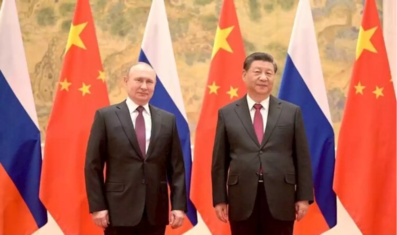 China accused of cyberattack as Putin and Xi Jinping ‘colluding’ before Ukraine invasion