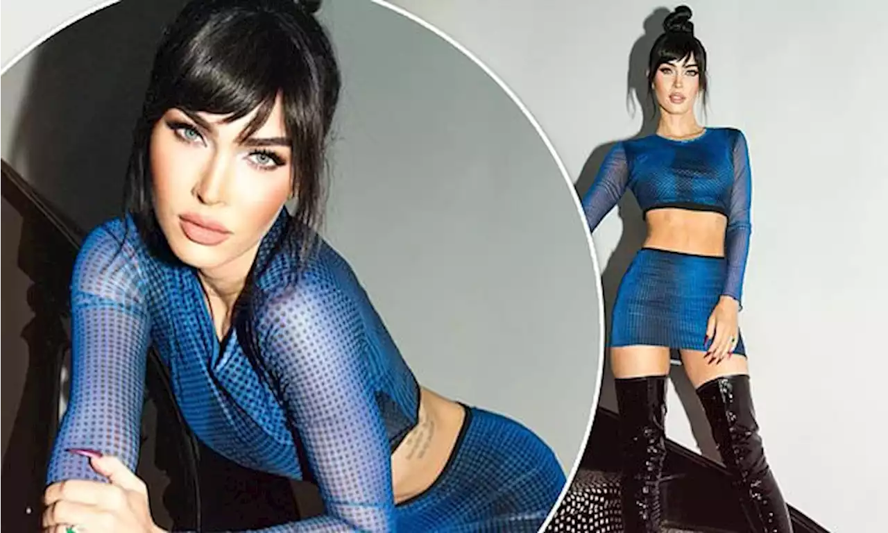 Megan Fox flaunts toned tummy and tiny waist in futuristic outfit