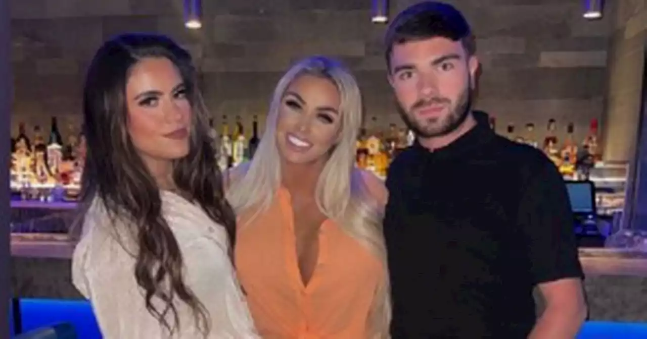 Katie Price kisses business partner on night out