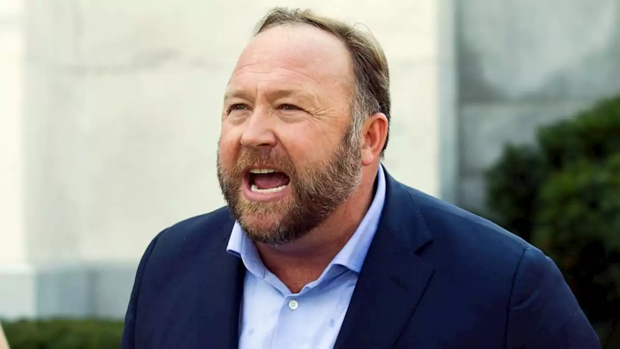 Judge delays Alex Jones trial as Infowars seeks bankruptcy