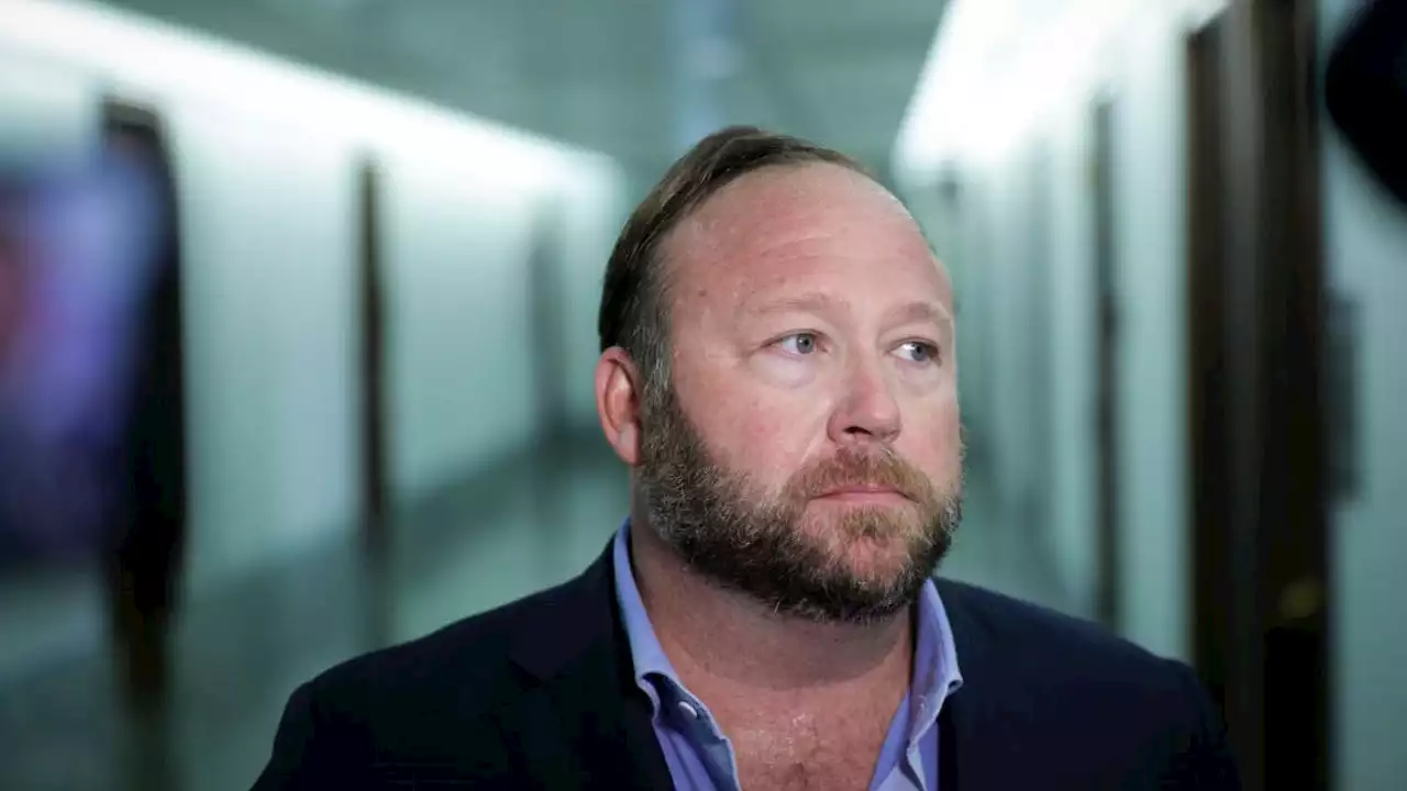 Alex Jones trial postponed as Infowars seeks bankruptcy