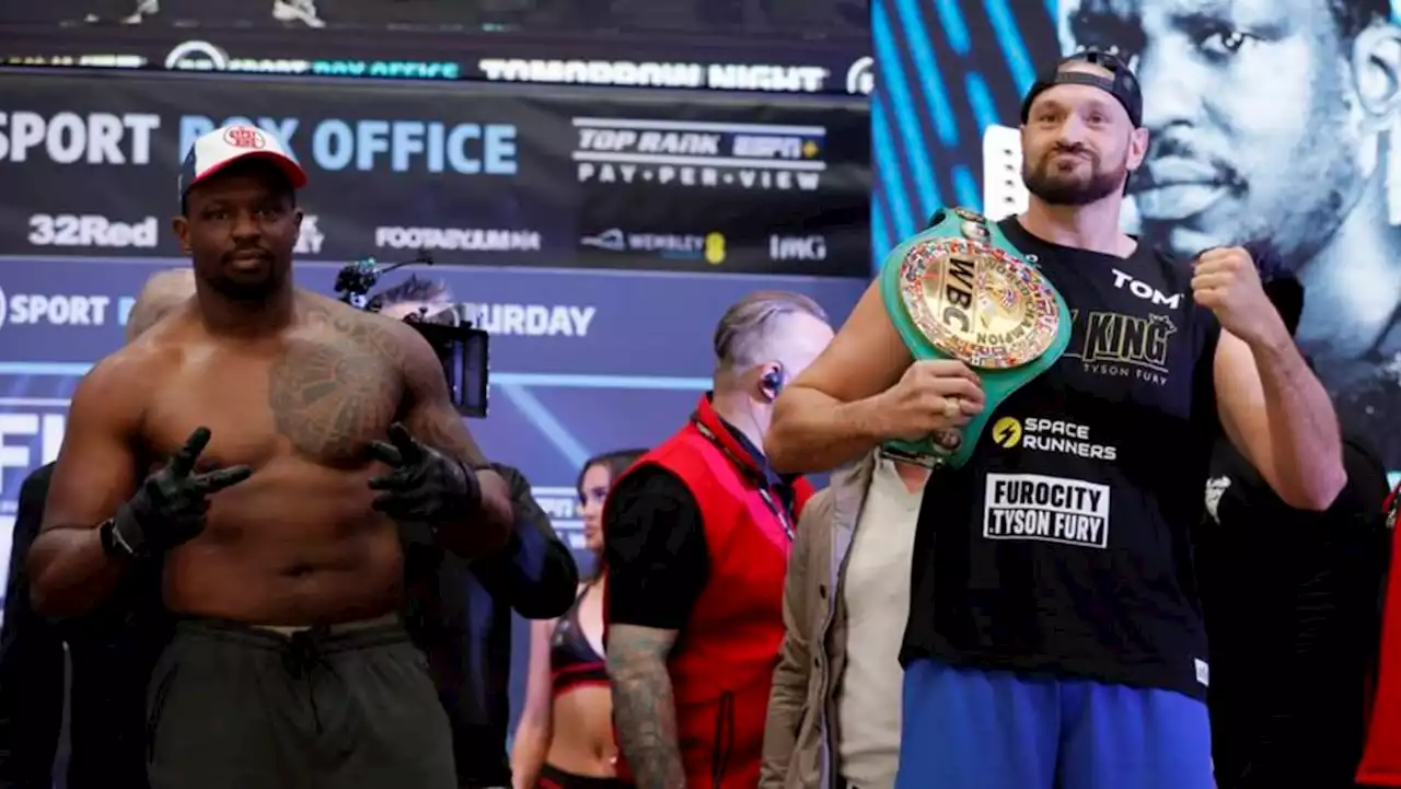 Boxing-Fury weighs in heavier than contender Whyte ahead of title clash