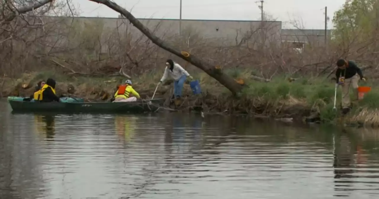 Volunteers clean the Jordan River for Earth Day