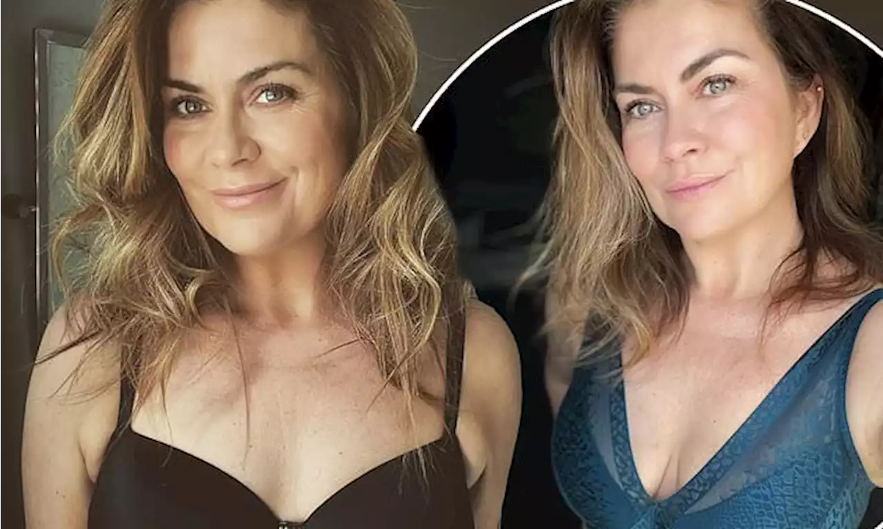 Amanda Lamb, 49, flaunts her assets in a busty lingerie