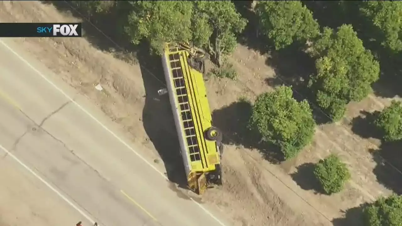 School bus carrying 11 people overturns into ditch in Ventura County