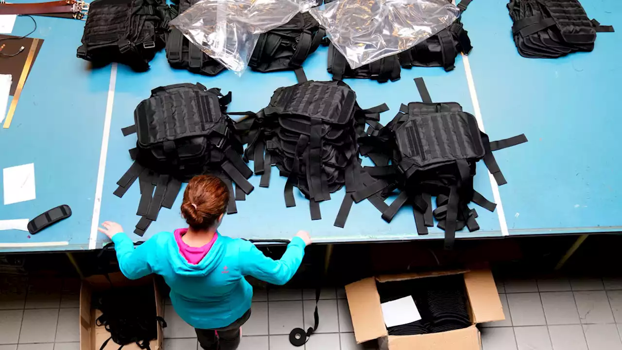 Refugees Make Protective Vests for Ukraine