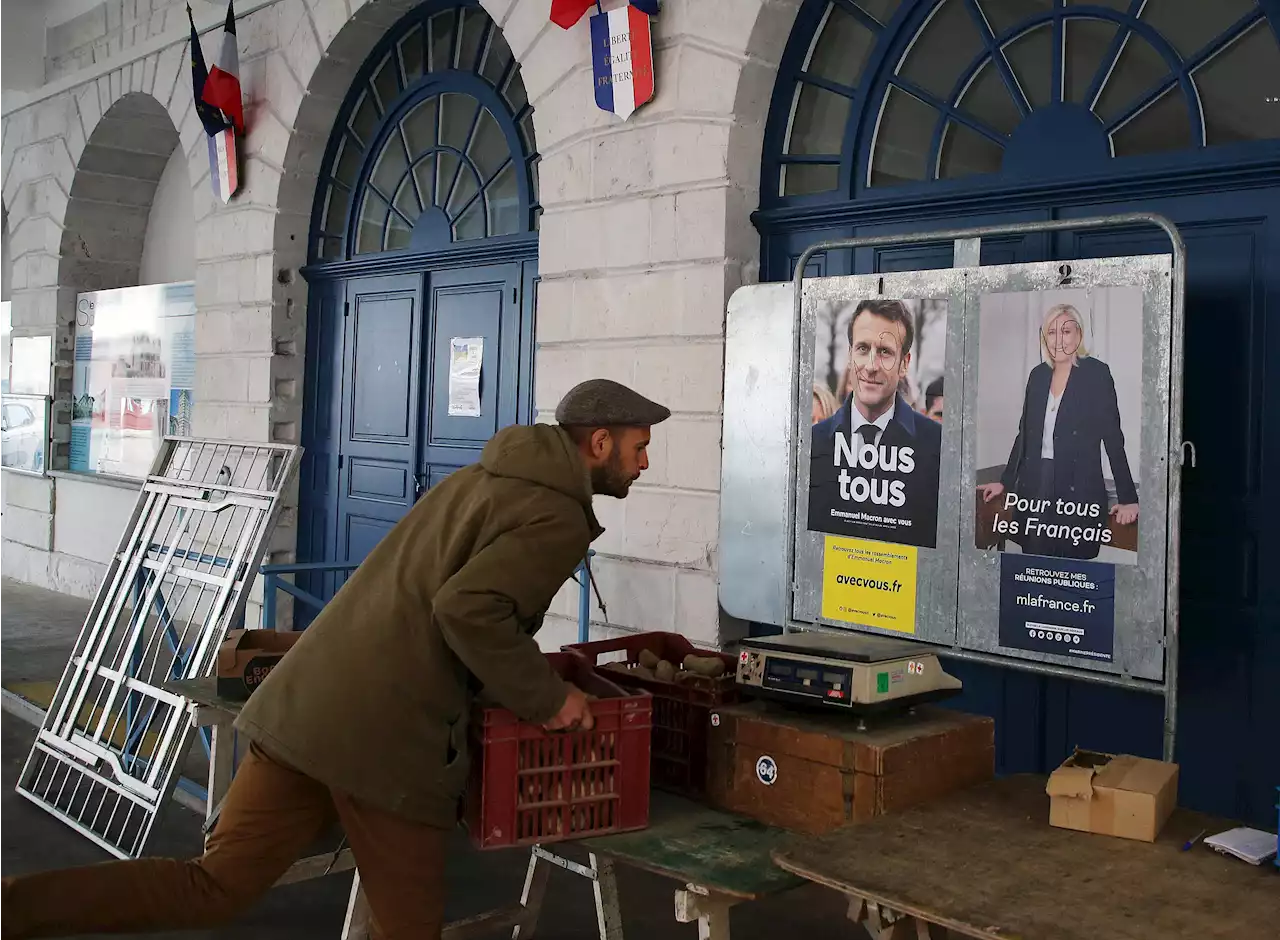 Macron vs Le Pen: France votes in tense presidential runoff