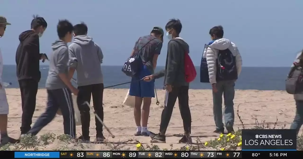 Volunteers gathered in Huntington Beach for beach cleanup