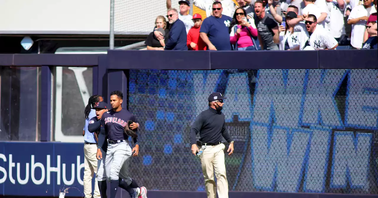 Yanks fans pelt Cleveland outfielders with debris after win