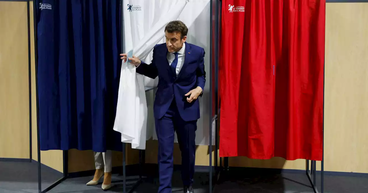 Macron and Le Pen square off in French presidential election as voters head to polls