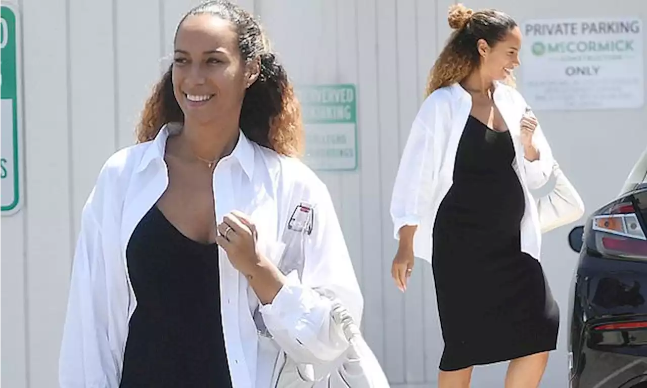 Leona Lewis shows off her growing baby bump in skintight black dress