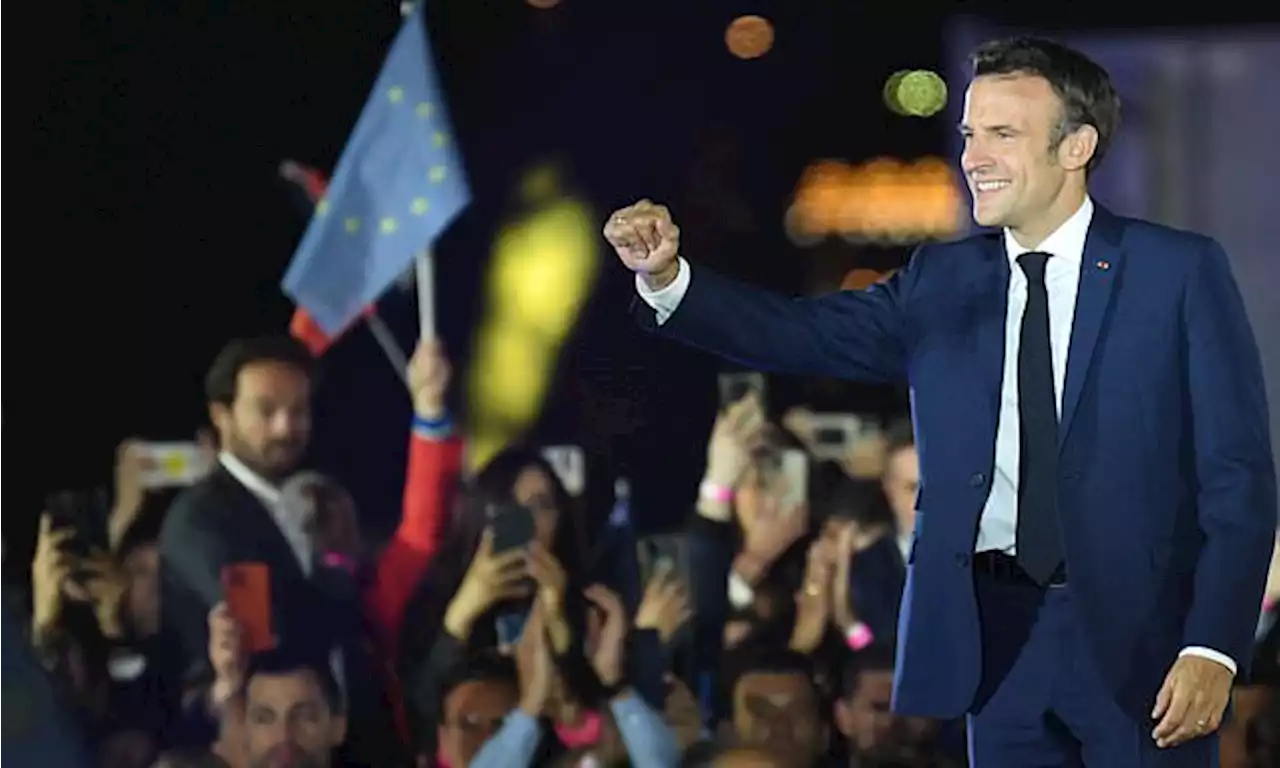 Emmanuel Macron holds on to French presidency beating Marine Le Pen