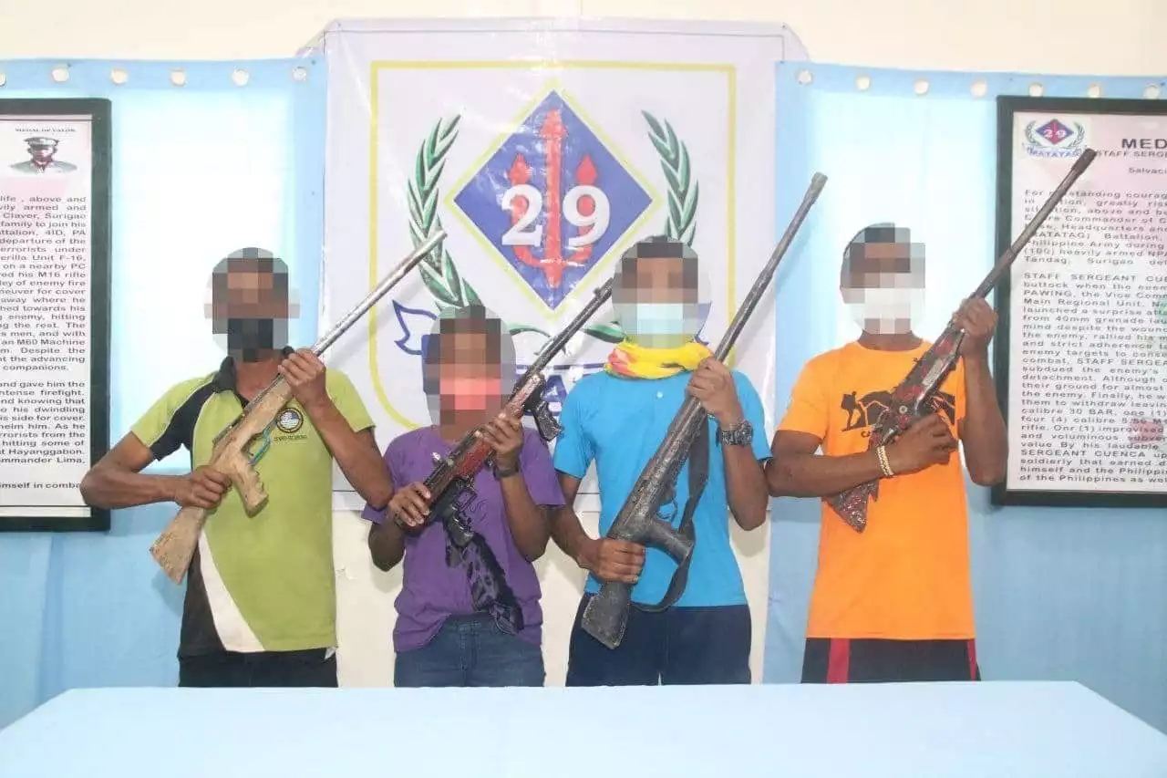 Hungry and tired of running, four NPAs surrender after clash with gov't troops in Agusan