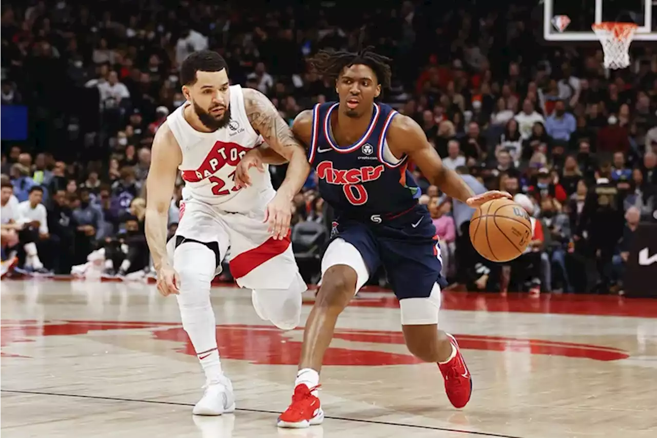 Toronto Raptors guard Fred VanVleet rips his jersey in frustration after suspected hip injury