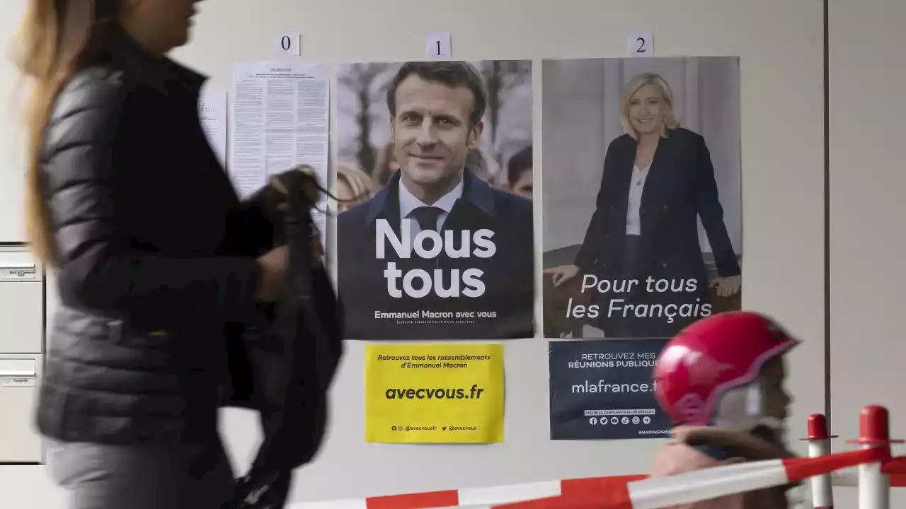 Polls open as Emmanuel Macron battles far-right Marine Le Pen for French presidency