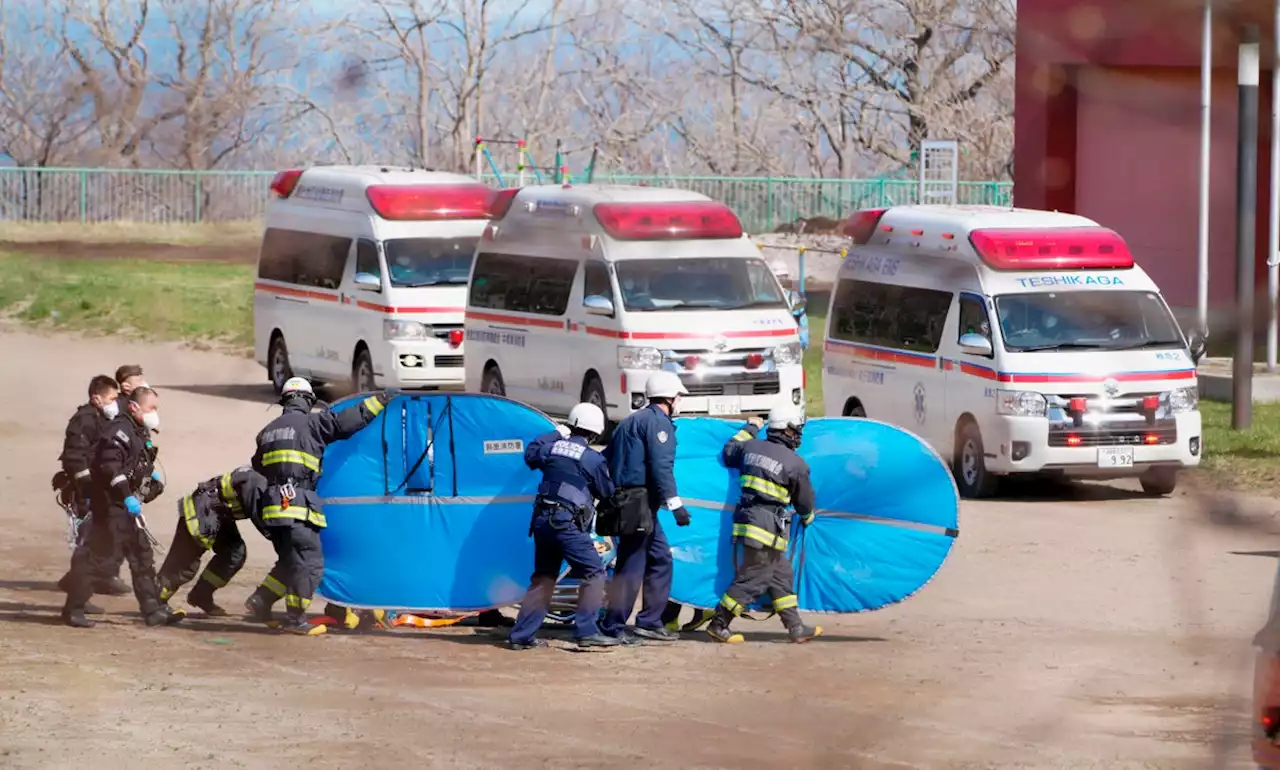 Rescuers find nine of 26 people from missing tour boat in northern Japan