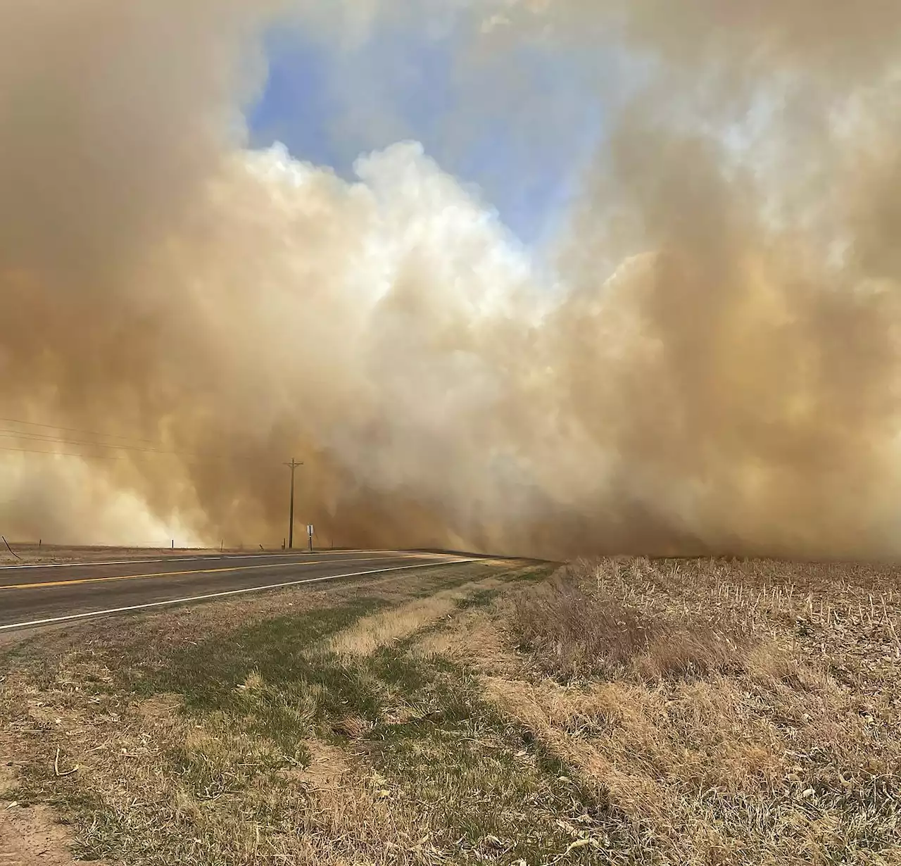 Wildfires tear across several states, driven by high winds