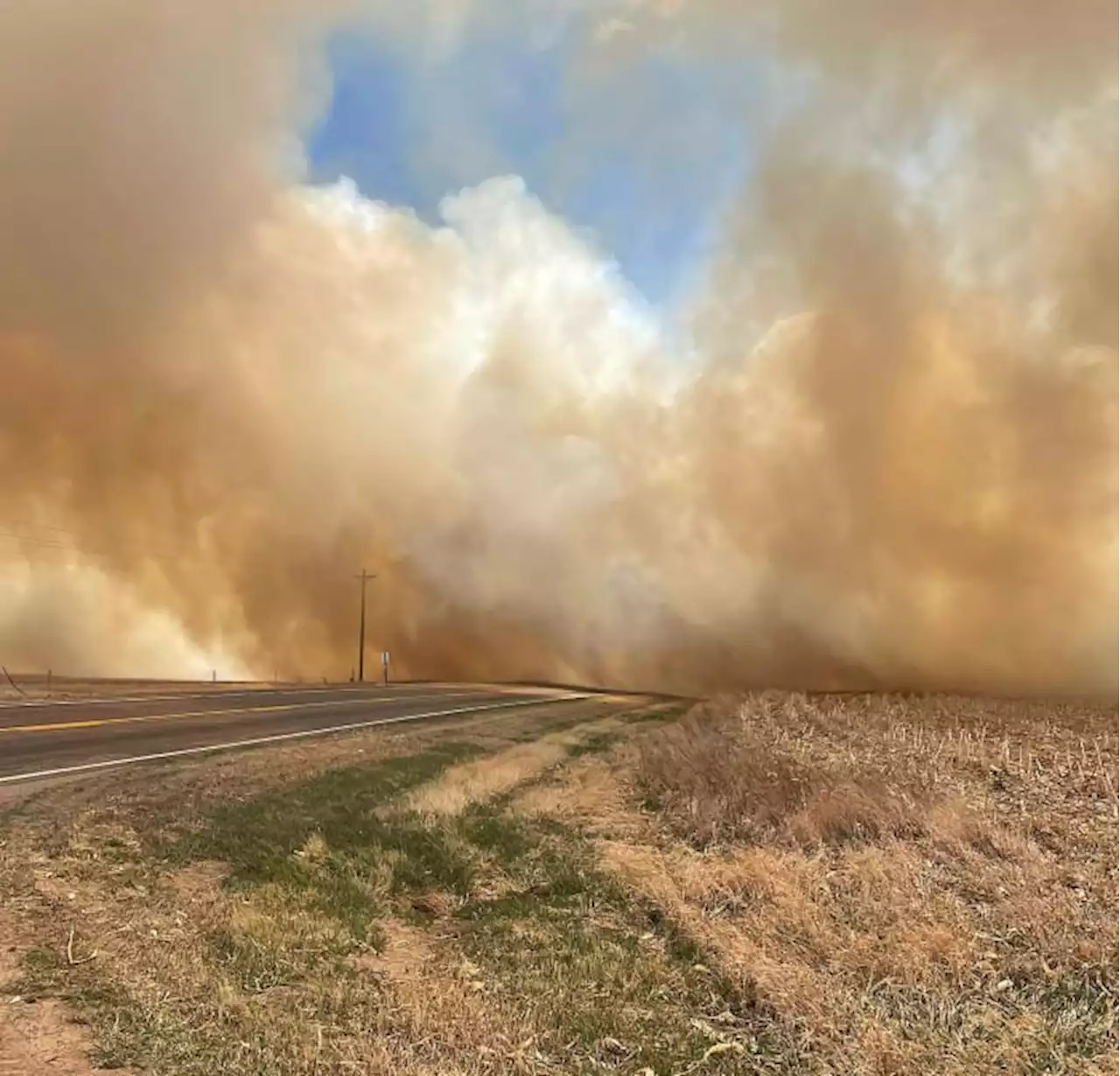 Wildfires tear across several states, driven by high winds