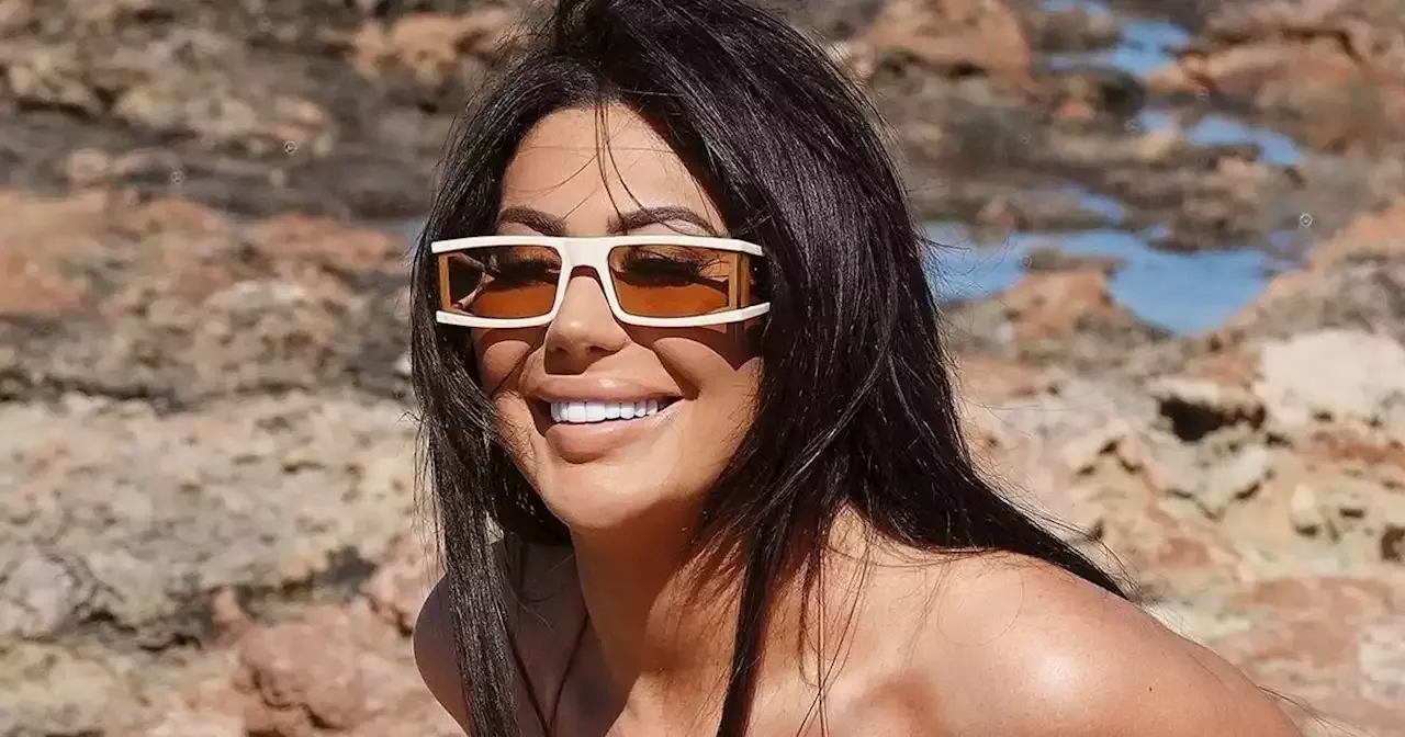 Chloe Ferry Reclines On The Beach As She Soaks Up Sun In Tiny String Bikini