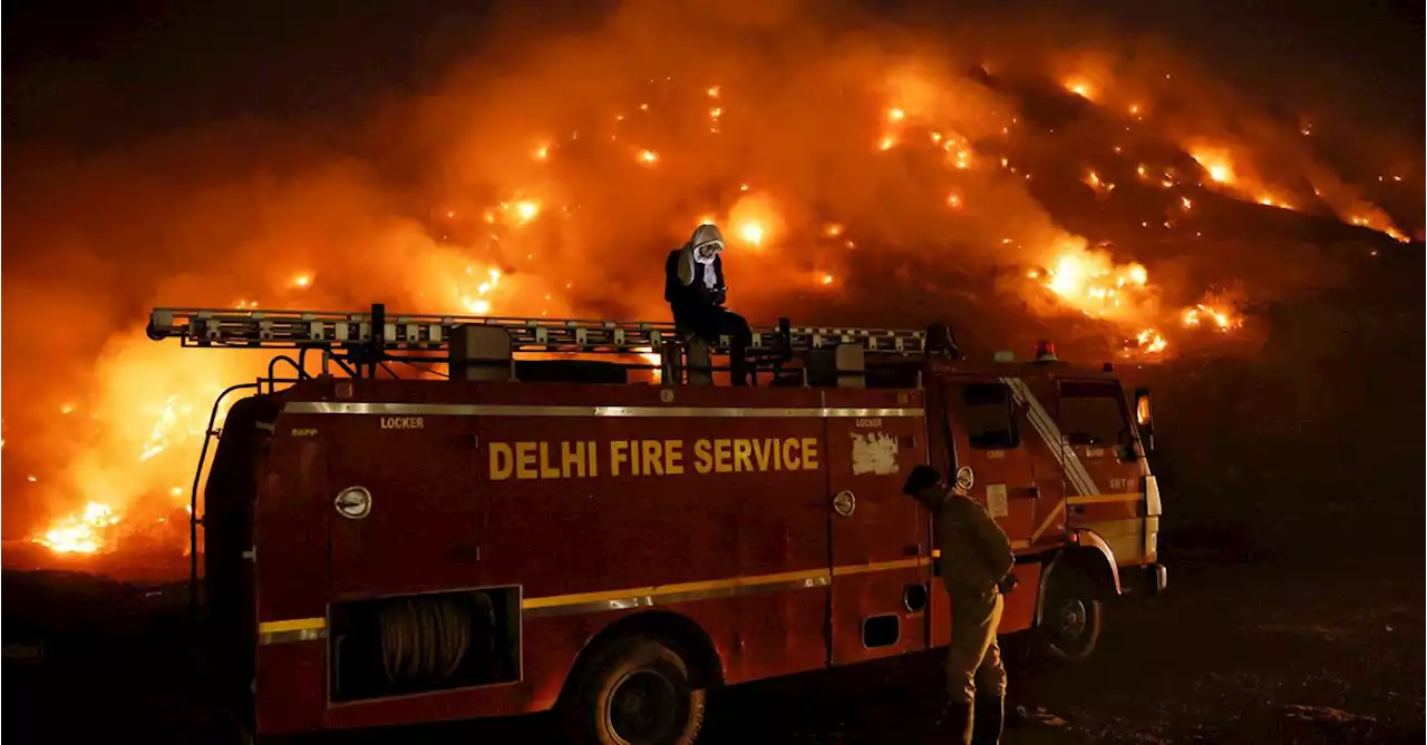 India too hot, says Modi, sending fire warning nationwide as Delhi landfill burns