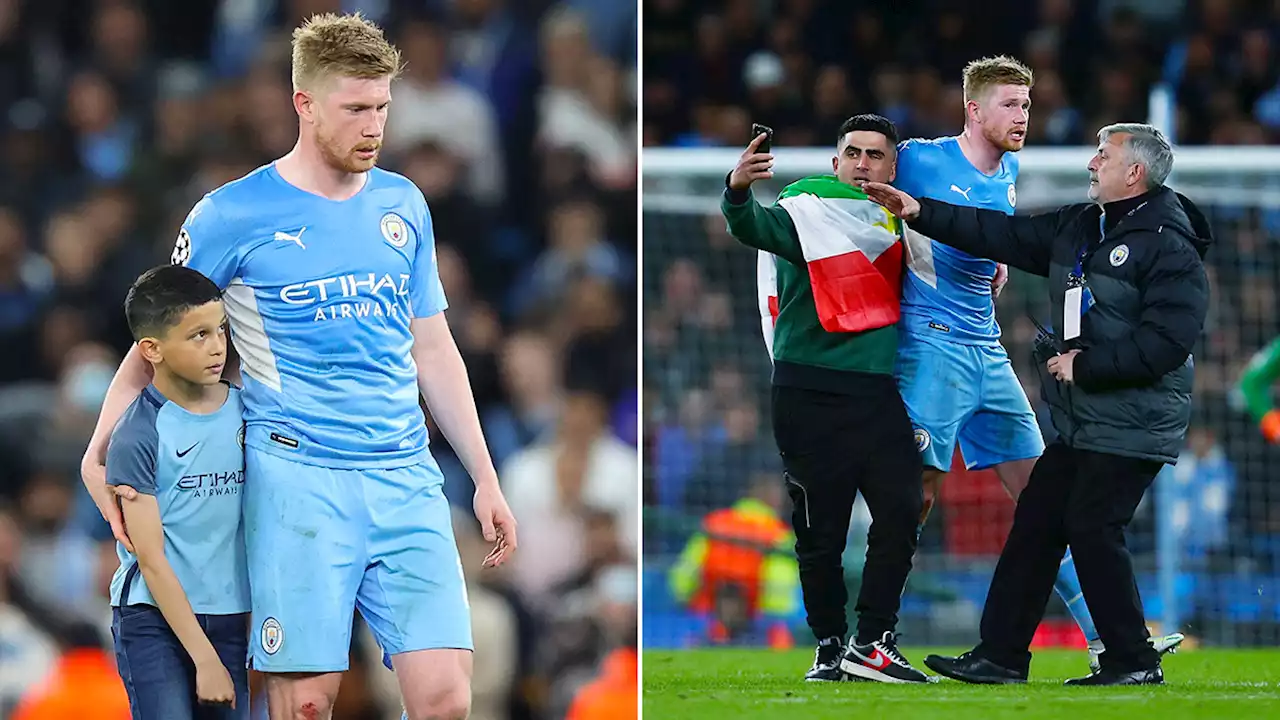 L'image que vous n'aviez pas vue: deux fans de Kevin De Bruyne envahissent la pelouse pour voir leur idole (photos)